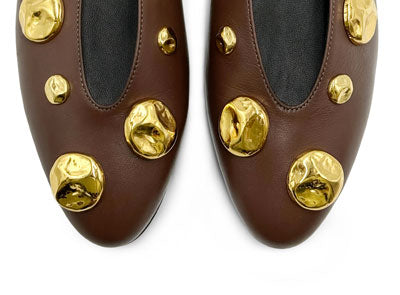 Brown leather ballet flats with V-cut and gold studs