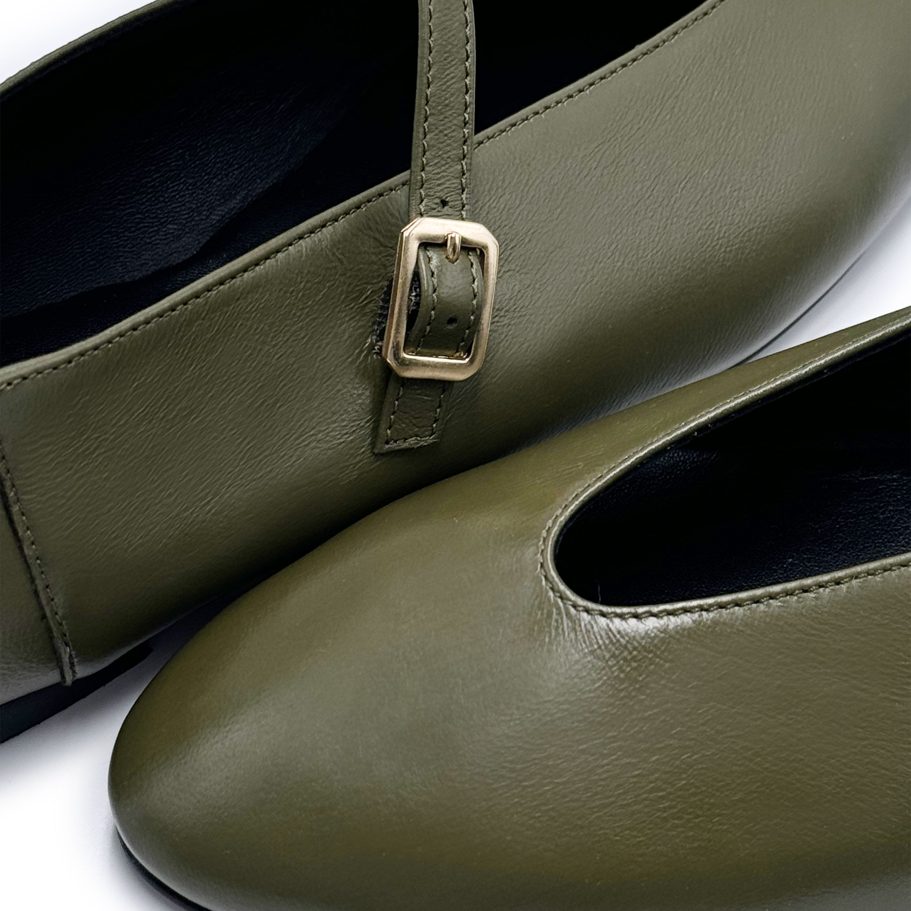 Olive green leather ballet flats with a V-cut and strap