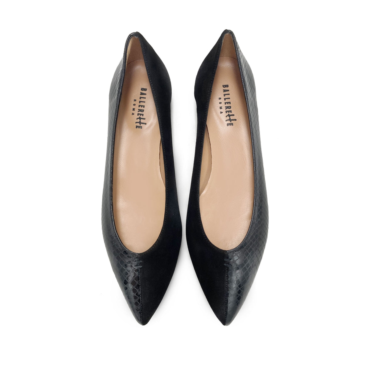 Bicolor pointed toe ballet flats in black